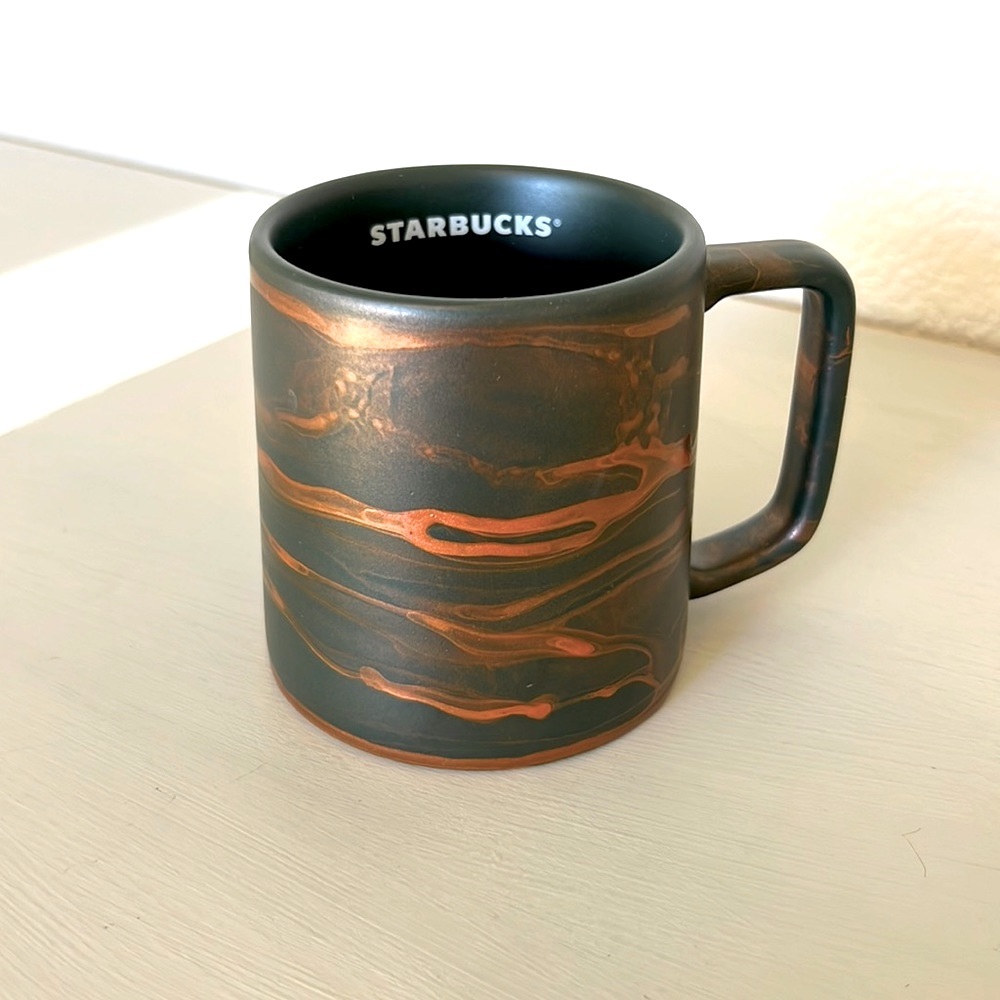 Rose gold, and green Starbucks mug